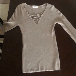 A cute tan ribbed long sleeve colored v neck top